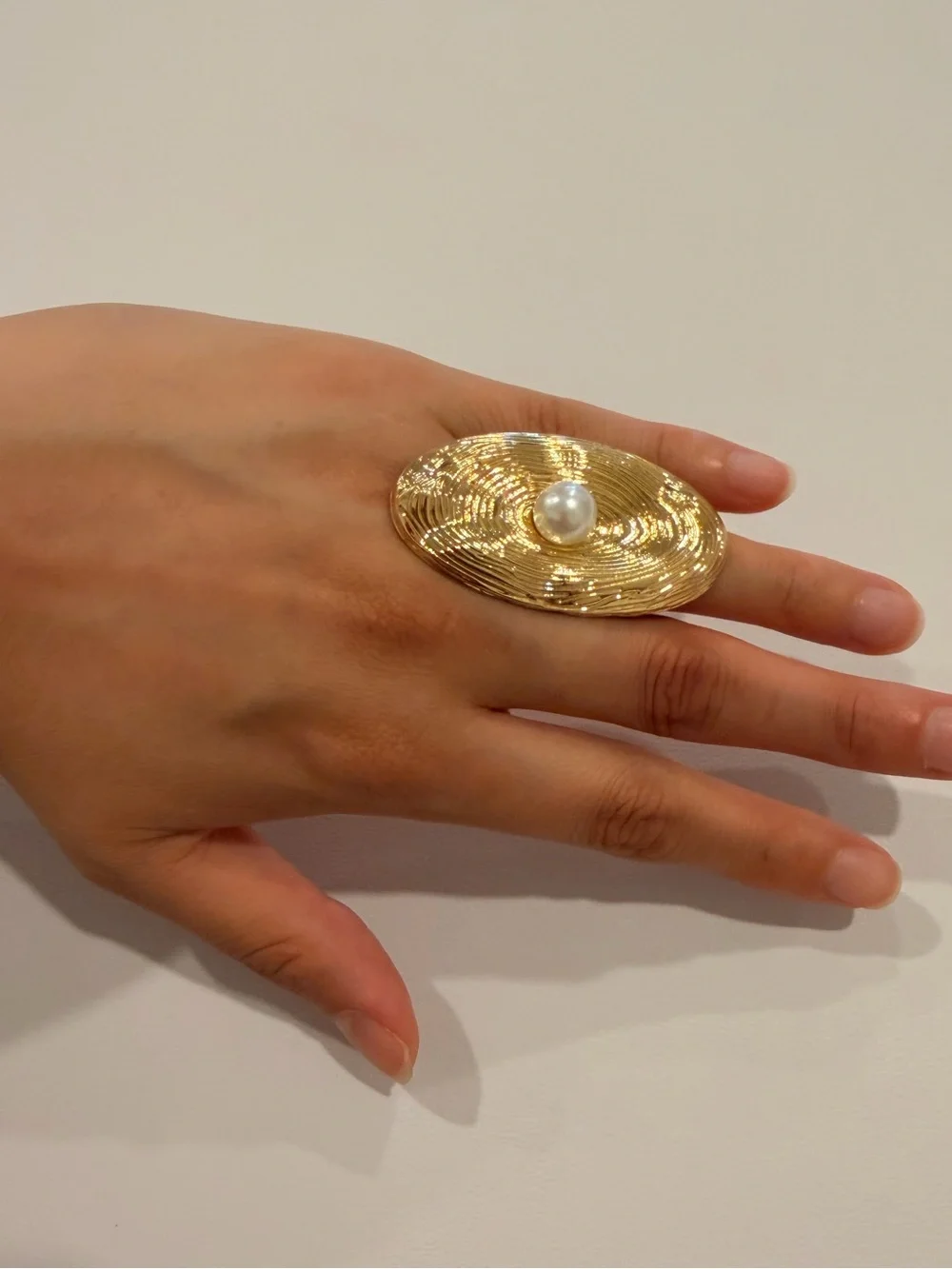 Gold Oval Textured Ring with Pearl Accent